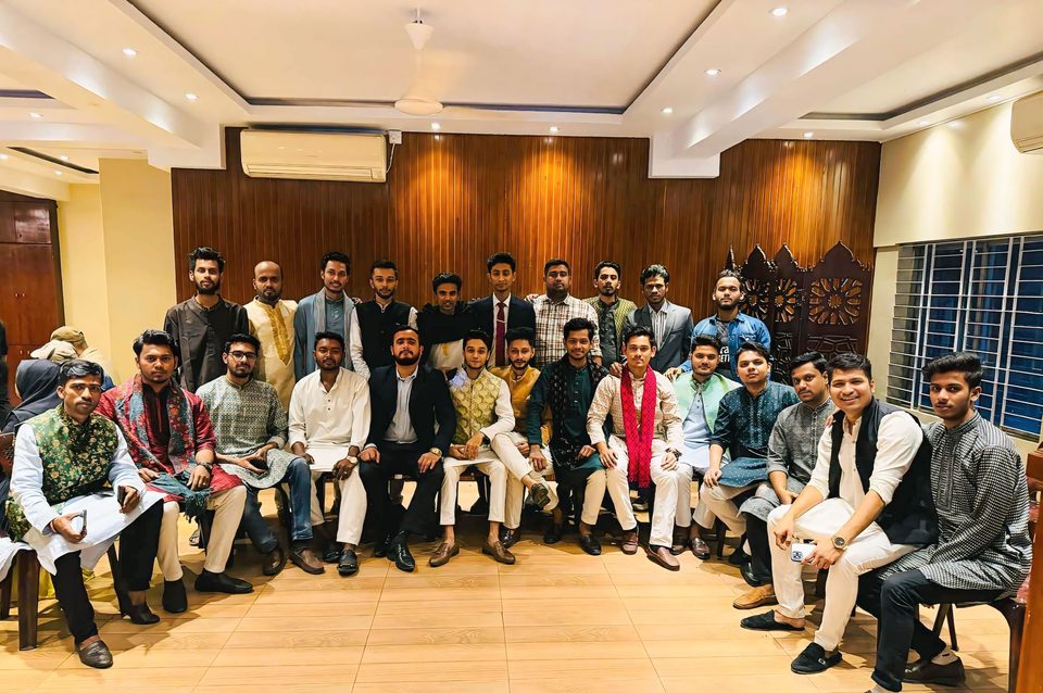 Shahriar with a group of friends and community members